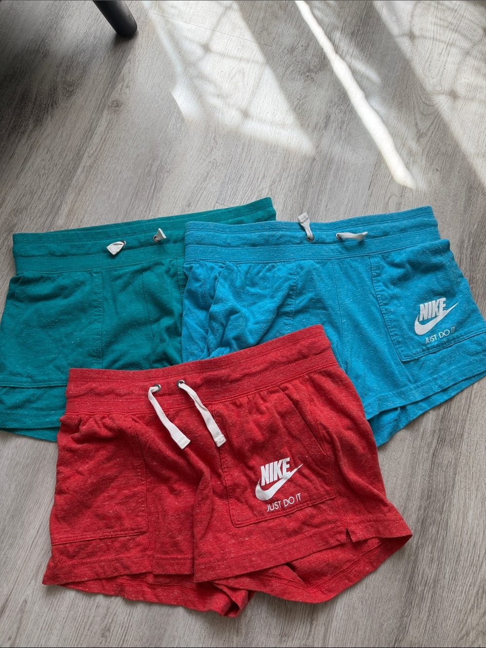 Nike Women’s Shorts in Red, Teal, and Turquoise